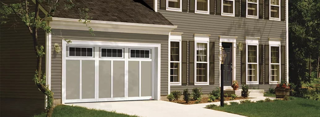 Eastman E-12, 14' x 7', Claystone door and Ice White overlays, 4 lite Orion windows 